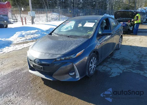 2021 Toyota Prius Prime Limited z USA, uszkodzony, nr VIN JTDKAMFP9M3172534